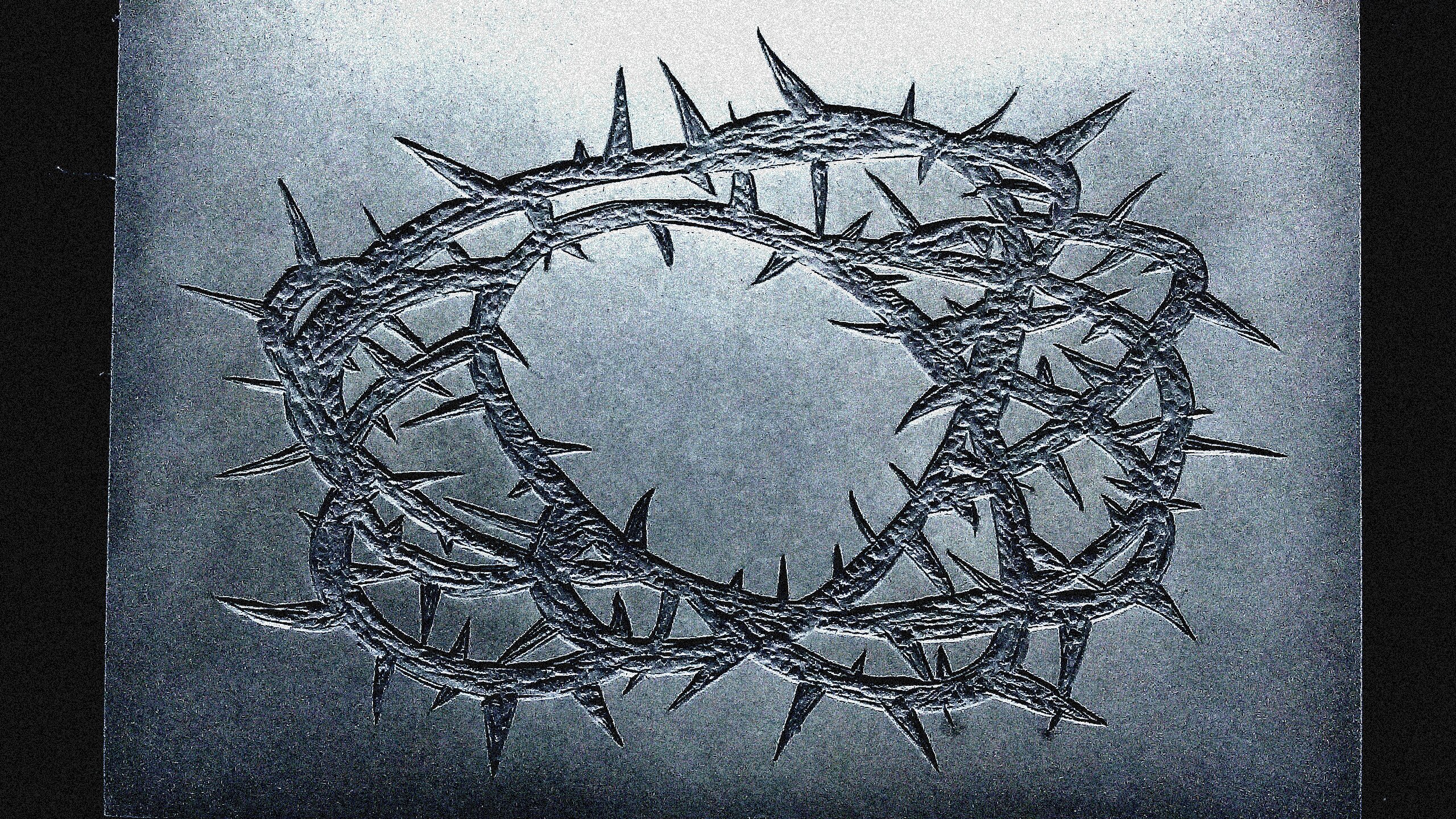 Image of crown of thorns cut into lino sheet ready for printing